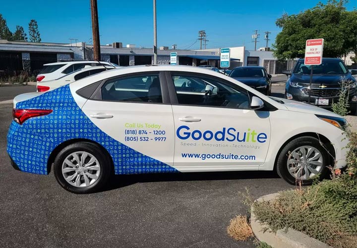 Car branding for GoodSuite with partial graphics featuring the logo and contact details