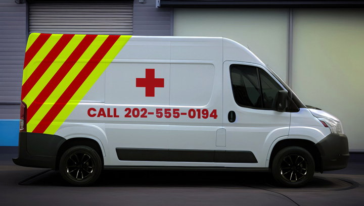 Reflective vehicle branding for ambulance van with bright colors for warning and safety